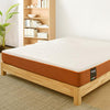 plain valmori latex mattress on top of a wooden bed frame with an indoor plant on its left side and a bookshelf